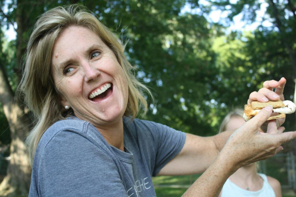 woman with ARBD laughing outdoors