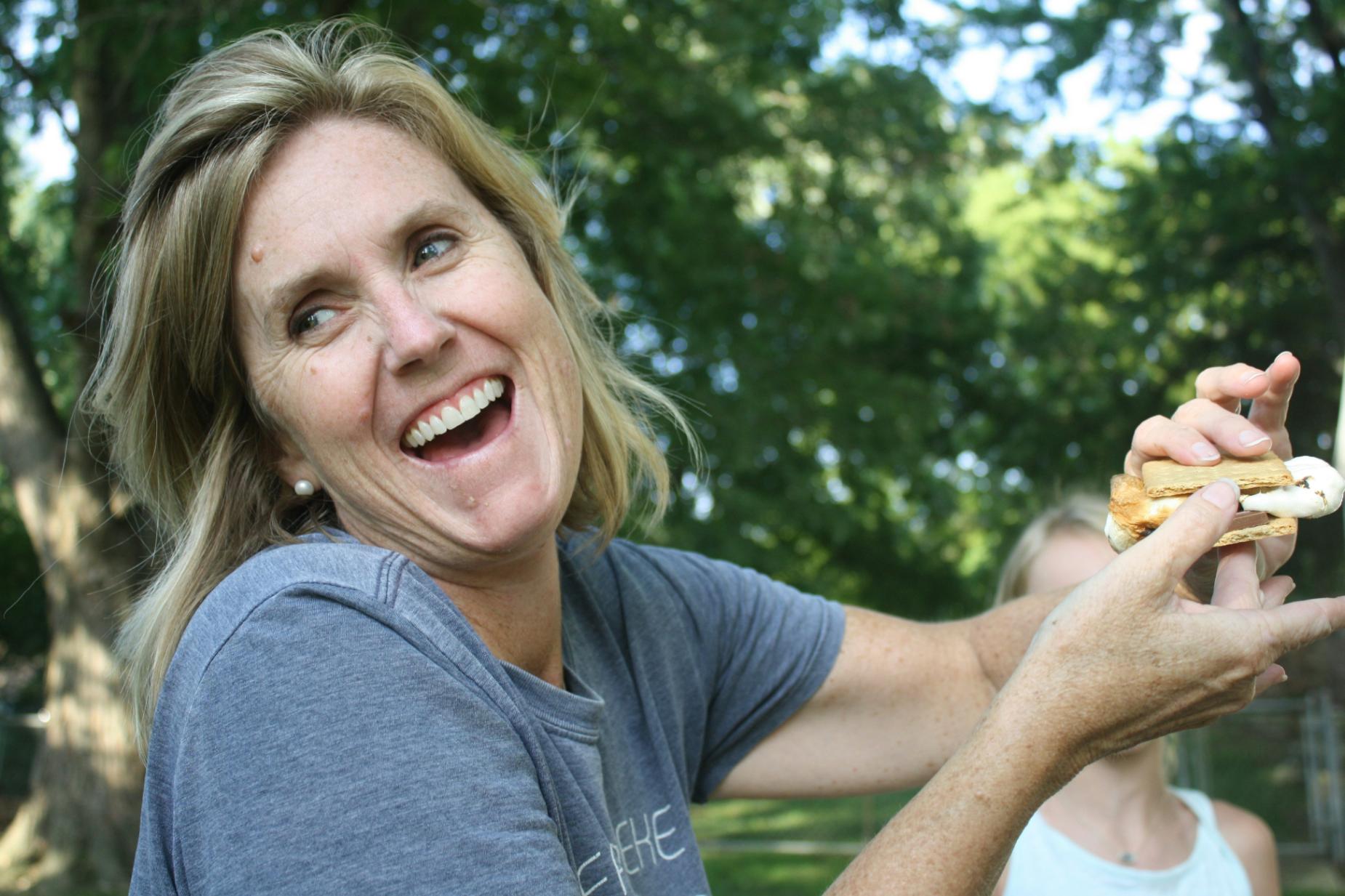 woman with ARBD laughing outdoors