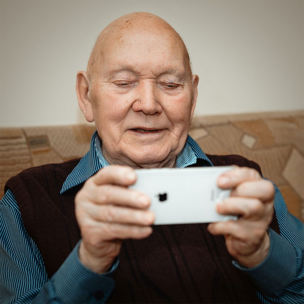 Resident looking at phone