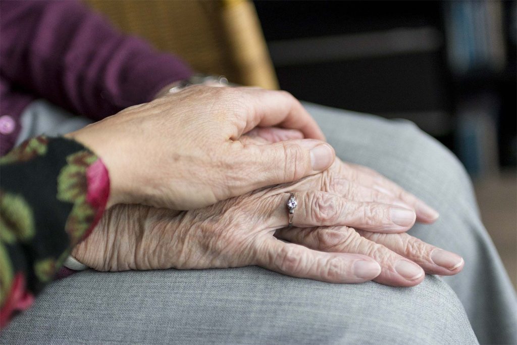 Holding hands for comfort