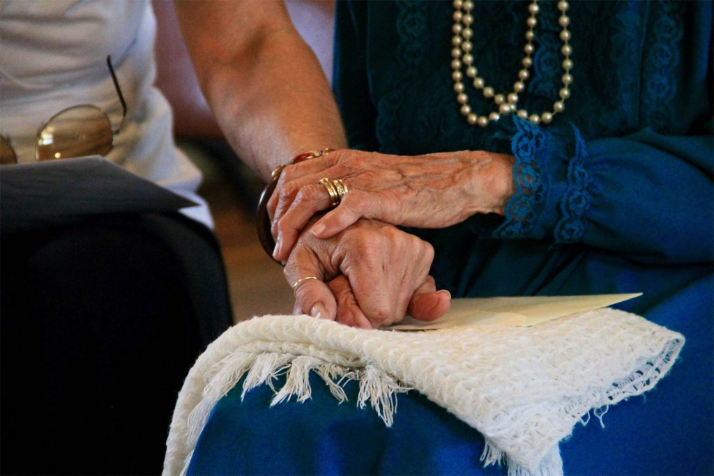 Holding hands for comfort