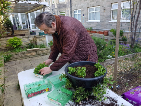 Resident enjoying some gardening